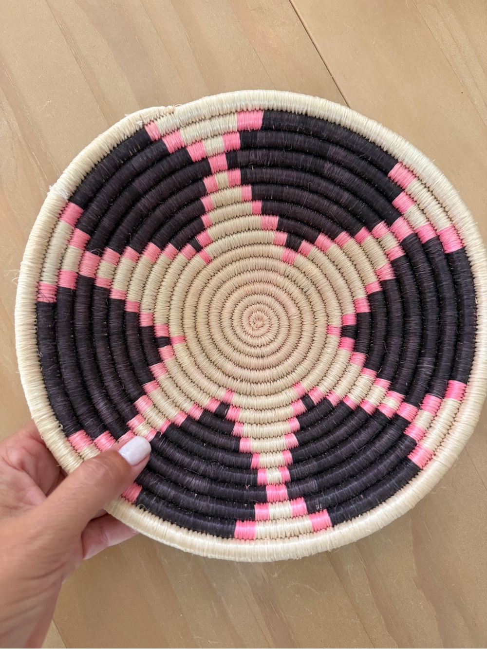 African Handwoven Decorative Basket tray in Black, cream, & bright Pink. - Picture 2 of 5